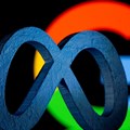 A 3D printed Facebook's new rebrand logo Meta is seen in front of displayed Google logo in this illustration. Source: Reuters/Dado Ruvic