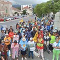 Environmental activists came together to picket outside Parliament to oppose TotalEnergies’ offshore drilling for oil and gas. Photo: Qaqamba Falintenjwa | GroundUp
