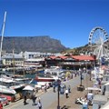 Tourists are returning to South Africa - but the sector will need to go green to deal with the country's electricity crisis