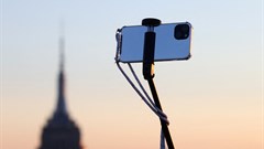 A smartphone is seen on a selfie stick in Manhattan, in New York City. Source: Reuters/Andrew Kelly