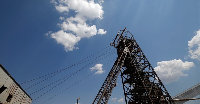 Clouds pass over the pit head at Sibanye Gold's Masimthembe shaft in Westonaria. Source: Reuters/Mike Hutchings
