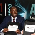 Source: Supplied. Nqobile Ndlovu, chief executive officer of ASLM and Tom Berkovits, senior director of Illumina Africa Middle East and Asia-Pacific during the MoU signing between The African Society for Laboratory Medicine and Illumina at the 6th Biennial ASLM2023 conference in Cape Town.