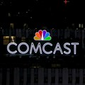 The NBC and Comcast logo are displayed on top of 30 Rockefeller Plaza, formerly known as the GE building, in midtown Manhattan in New York. Source: Reuters/Brendan McDermid