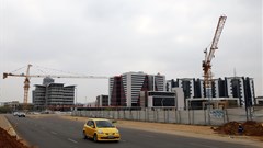 A car drives past a construction site of the Central Business District (CBD) in the capital Gaborone. Source: Reuters/Siphiwe Sibeko