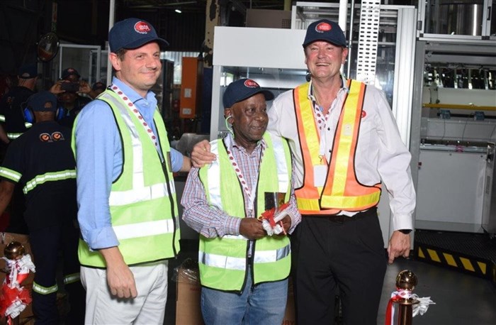 L to R: Coleus Packaging MD Ian Victor; Nokusa Packaging MD Phillip Sathekge and Astir Vitogiannis MD Stelios Vitogiannis in front of Coleus' new PMC500 machine. Image supplied