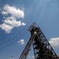 Clouds pass over the pit head at Sibanye Gold's Masimthembe shaft in Westonaria. Source: Reuters/Mike Hutchings