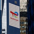 The logo of French oil and gas company TotalEnergies is seen at the company's headquarters skyscraper in the financial and business district of La Defense, near Paris. Source: Reuters/Gonzalo Fuentes