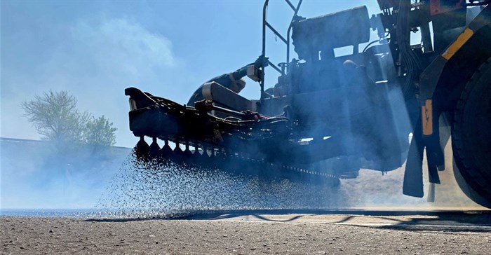 Rubber bitumen being applied for a spray seal application