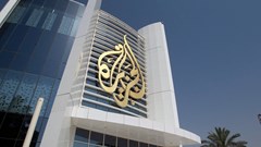The Al Jazeera Media Network logo is seen on its headquarters building in Doha, Qatar June 8, 2017. REUTERS/Naseem Zeitoon/File Photo