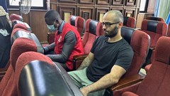 Tigran Gambaryan, an executive of Binance, the world's largest cryptocurrency exchange, sits as he waits to face prosecution for tax evasion and money laundering at the federal high court in Abuja, Nigeria, 4 April 2024. Reuters/ Abraham Achirga