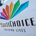 A MultiChoice logo is displayed outside the company's building in Cape Town, South Africa. Source: Reuters/Esa Alexander.