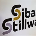 A logo of Sibanye Stillwater is seen at a mine in Marikana, outside Rustenburg. Source: Reuters/Siphiwe Sibeko
