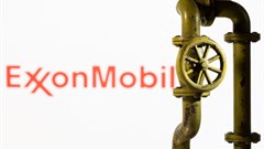 A 3D printed natural gas pipeline is placed in front of displayed ExxonMobil logo. Source: Reuters/Dado Ruvic