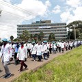 Doctors and medical practitioners under the Kenya Medical Practitioners Pharmacists and Dentists Union (KMPDU) participate in a demonstration to demand payment of their salary arrears and the immediate hiring of trainee doctors, among other grievances, in Nairobi, Kenya, 16 April 2024. Reuters/Thomas Mukoya/File Photo