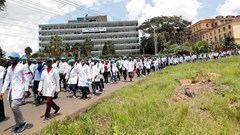Doctors and medical practitioners under the Kenya Medical Practitioners Pharmacists and Dentists Union (KMPDU) participate in a demonstration to demand payment of their salary arrears and the immediate hiring of trainee doctors, among other grievances, in Nairobi, Kenya, 16 April 2024. Reuters/Thomas Mukoya/File Photo