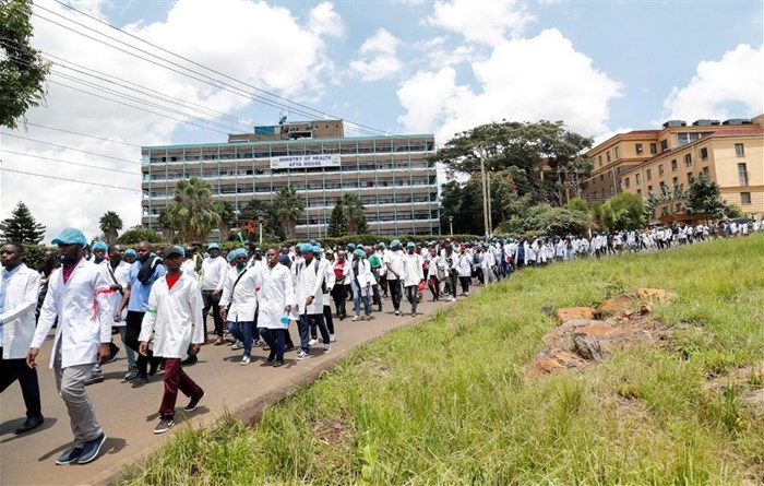 Doctors and medical practitioners under the Kenya Medical Practitioners Pharmacists and Dentists Union (KMPDU) participate in a demonstration to demand payment of their salary arrears and the immediate hiring of trainee doctors, among other grievances, in Nairobi, Kenya, 16 April 2024. Reuters/Thomas Mukoya/File Photo