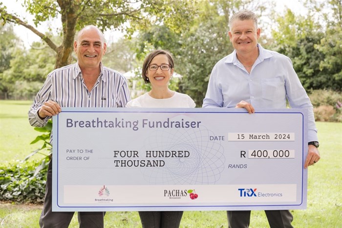 Supplied image (L-R): Jan Willem Pont from Pachas Restaurant Pretoria, Maré Smit, Director of Breathtaking Fundraising NPC and Hannes Taute from TRX Electronics.