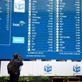 A man takes a photograph of the election results at the National Results Operation Centre of the IEC, which serves as an operational hub where results of the national election are displayed, in Midrand, South Africa, 2 June 2024. Reuters/Ihsaan Haffejee