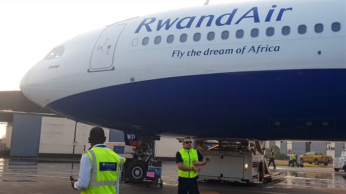 A Rwandair plane is seen at the Kanombe, Kigali International Airport in Kigali, Rwanda January 12, 2020. REUTERS/Clement Uwiringiyimana/File photo