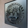 International Monetary Fund (IMF) logo is seen outside the headquarters building in Washington, US, as IMF Managing Director Christine Lagarde meets with Argentine Treasury Minister Nicolas Dujovne, 4 September 2018. Reuters/Yuri Gripas/File Photo