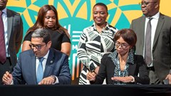 Source: Supplied. Haytham El Maayergi, executive vice president, Global Trade Bank, Afreximbank and Smangele Mandidi, acting managing director of CBZ Bank during the signing ceremony.