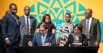 Source: Supplied. Haytham El Maayergi, executive vice president, Global Trade Bank, Afreximbank and Smangele Mandidi, acting managing director of CBZ Bank during the signing ceremony.
