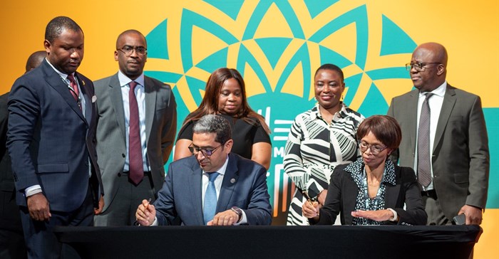 Source: Supplied. Haytham El Maayergi, executive vice president, Global Trade Bank, Afreximbank and Smangele Mandidi, acting managing director of CBZ Bank during the signing ceremony.
