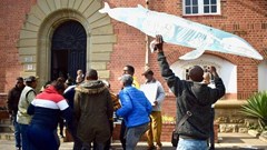 Local community members and supporters of Sustaining the Wild Coast and Greenpeace celebrated a court victory outside the Eastern Cape High Court in Makhanda in September 2022. Archive photo: Lucas Nowicki / GroundUp