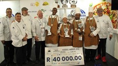 Pictured: (from left): Glenn McGinn (emcee from Visual Feast Group), Rudi Mueller (head judge), Jeff Scheuremans (organiser), Trevor Boyd (judge and general manager of F&B operations at City Lodge Hotels), contestants from Courtyard Hotel Waterfall City are Evans Mtombela (chef de partie), Erick Mbudu (junior sous chef), Ro-Anne Williams (pastry/commis chef) and Natalie Schoonbee (executive chef), and Martin Kobald (organiser)