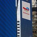 The logo of French oil and gas company TotalEnergies is seen at the company's headquarters skyscraper in the financial and business district of La Defense, near Paris. Source: Reuters/Gonzalo Fuentes