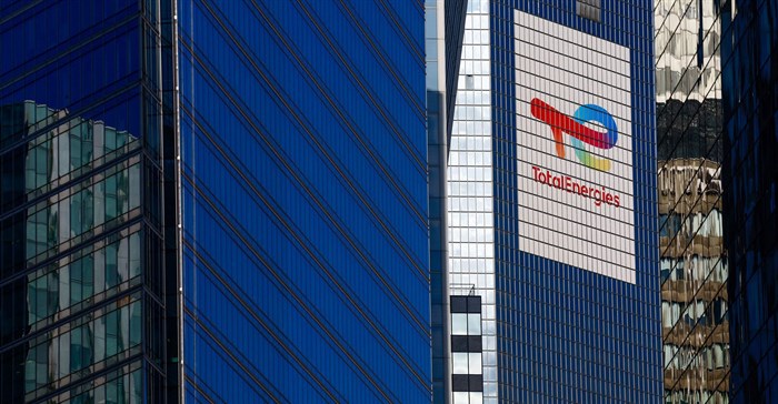 The logo of French oil and gas company TotalEnergies is seen at the company's headquarters skyscraper in the financial and business district of La Defense, near Paris. Source: Reuters/Gonzalo Fuentes