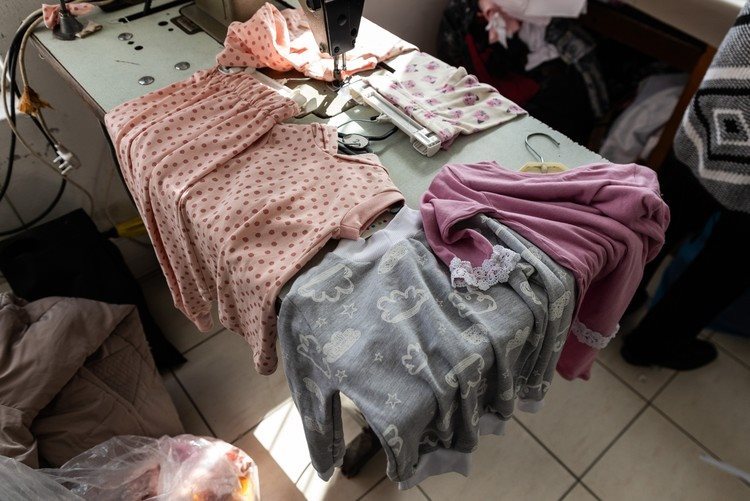 The nine women produce a range of items, from tracksuits and formal clothing to children’s wear, headbands and turbans.