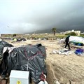 People living in makeshift shelters outside the Castle of Good Hope in Cape Town have been cold and wet this week. The site is owned by the Department of Public Works. Photos: Matthew Hirsch / Groundup