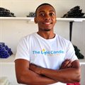 Young entrepreneur's candle business shines bright despite challenges