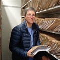 The Department of Social Development’s Annemie Van Reenen with hundreds of files in the registry at the department’s Langa office. A new app is designed to cut down on paperwork and filing for social workers. Photo: Marecia Damons / GroundUp