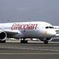 A member of the ground crew directs an Ethiopian Airlines Boeing 787-8 Dreamliner plane at the Bole International Airport in Ethiopia's capital Addis Ababa, August 21, 2015. REUTERS/Tiksa Negeri/File Photo
