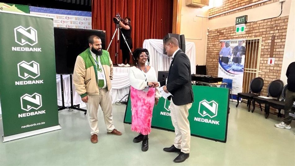 Buhle Ndudula accepts runner-up prize for I have a Technology Business from Nedbank