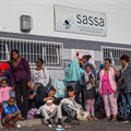 Socal grant applicants queue at the Eerste River Sassa office. Archive photo: Ashraf Hendricks / GroundUp