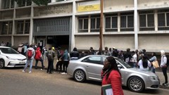 Scores of people queued outside the labour office in Cape Town’s city centre on Wednesday. The UIF’s online portal has been offline for about three weeks. Photos: Mary-Anne Gontsana / GroundUp