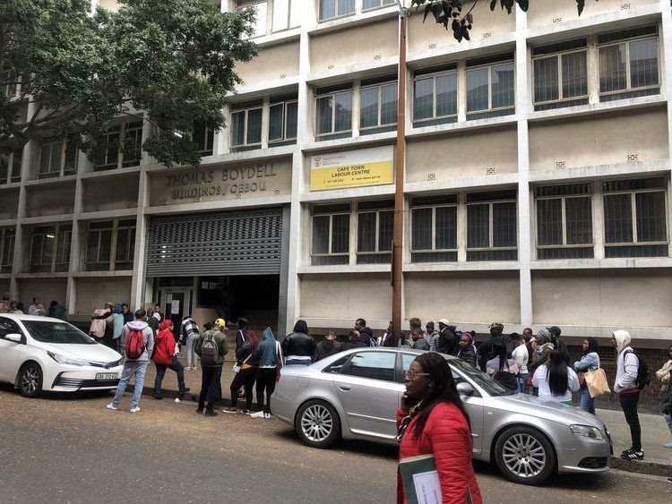 Scores of people queued outside the labour office in Cape Town’s city centre on Wednesday. The UIF’s online portal has been offline for about three weeks. Photos: Mary-Anne Gontsana / GroundUp