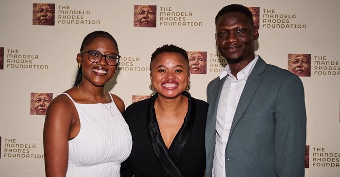 2024 Äänit Prize winners Chido Dzinotyiwei (left) and Ismail Dumutu (right) with Judy Sikuza, CEO of the Mandela Rhodes Foundation (middle) (Image supplied)
