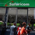 Pedestrians walk outside the Safaricom mobile phone customer care centre during the launch of its 5G internet service in the central business district of Nairobi, Kenya, 27 October 2022. Reuters/Monicah Mwangi/File Photo