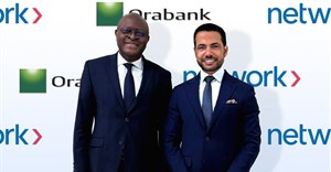 Source: Supplied. Ferdinand Ngon Kemoum, group chief executive officer, Orabank Group and Reda Helal, group managing director – processing, Africa and co-head group processing, Network International.