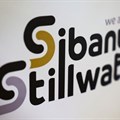 A logo of Sibanye Stillwater is seen at a mine in Marikana, outside Rustenburg, northwest of Johannesburg, South Africa, 14 March 2024. Reuters/Siphiwe Sibeko/File Photo
