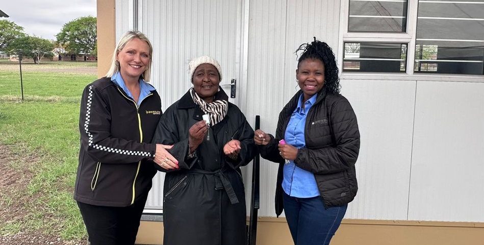 Joanne de Freitas, Dunlop Tyres SA manager: PR and Events, Headmistress Sibongile Tshabalala, and Thuli Gasa, Dunlop Tyres SA manager: Strategic Planning, celebrate the new classrooms
