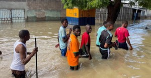 Residents walk in a flooded area during rescue operations in Maiduguri, northern Borno state, Nigeria, 12 September 2024. Reuters/Ahmed Kingimi/File Photo