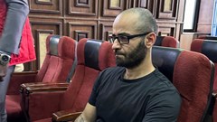 Tigran Gambaryan, an executive of Binance, the world's largest cryptocurrency exchange, sits as he waits to face prosecution for tax evasion and money laundering at the federal high court in Abuja, Nigeria, 4 April 2024. Reuters/ Abraham Achirga/File Photo