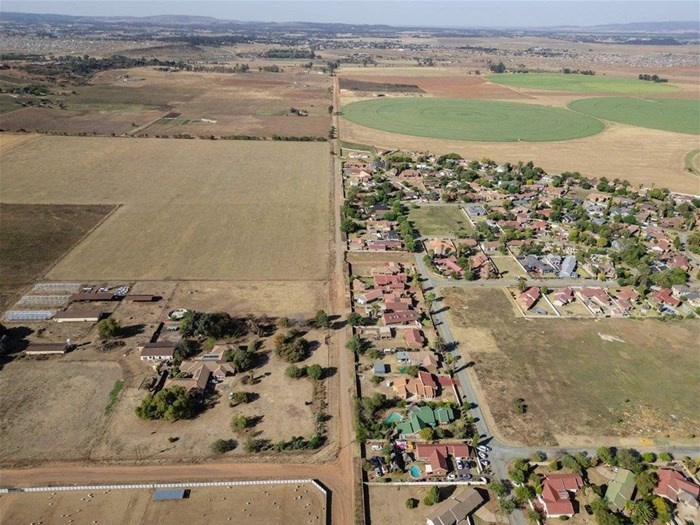 The suburb of Falcon Ridge (right) would be surrounded by the proposed mine which would operate on the nearby farmlands.