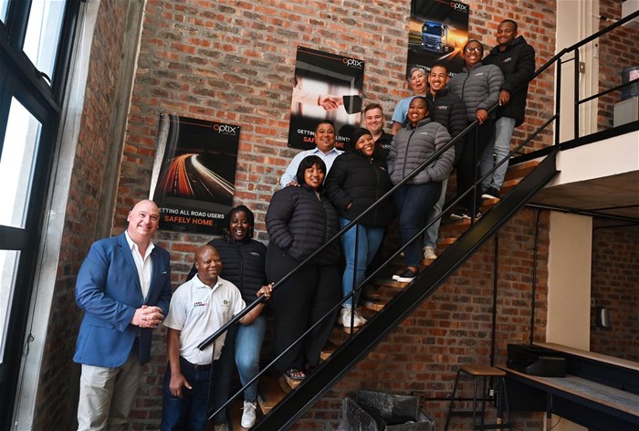 Mayoral Committee Member for Economic Growth, Alderman James Vos with the Optic Fleet team.