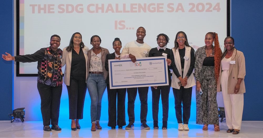 Winning team with the SDG Challenge organisers and jury members